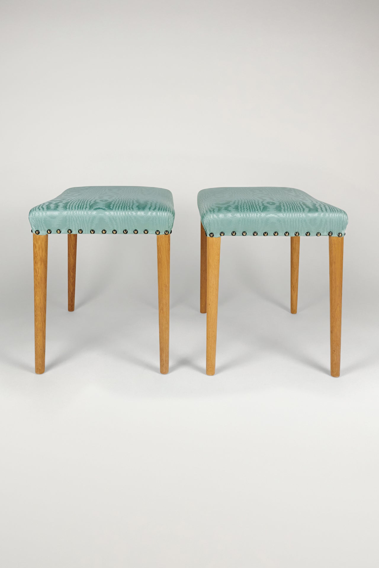 Pair of Green Moire Ottomans